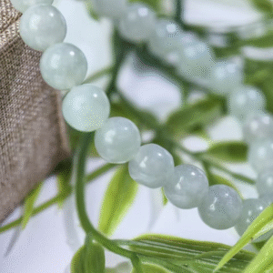 natural-jadeite-light-green-8mm-bead-bracelet-close-up